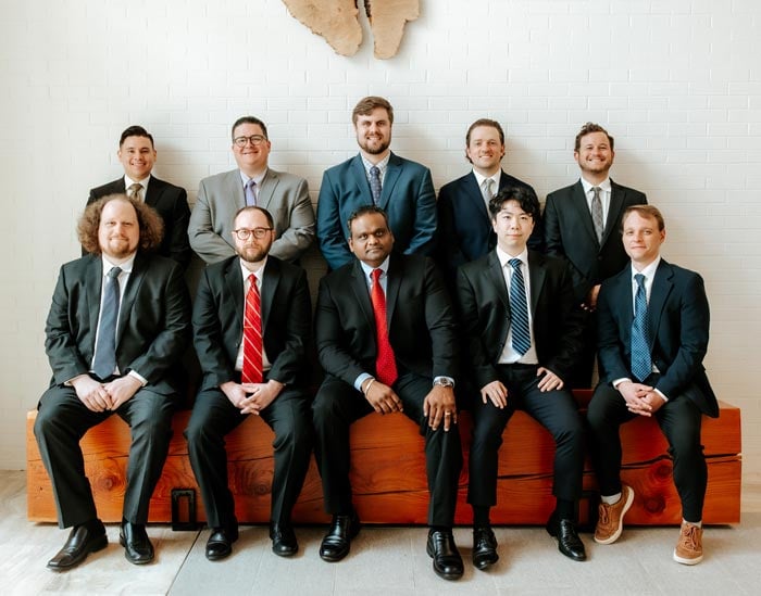 Group photo of the male attorneys of the firm